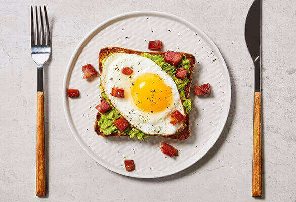 Avocado Toast with Egg and Crispy Pancetta on Country Grain - 700