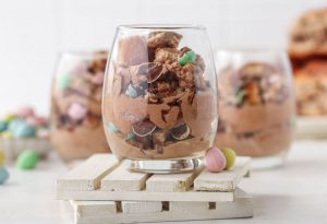 hot cross bun dessert mouse in a cup on a table